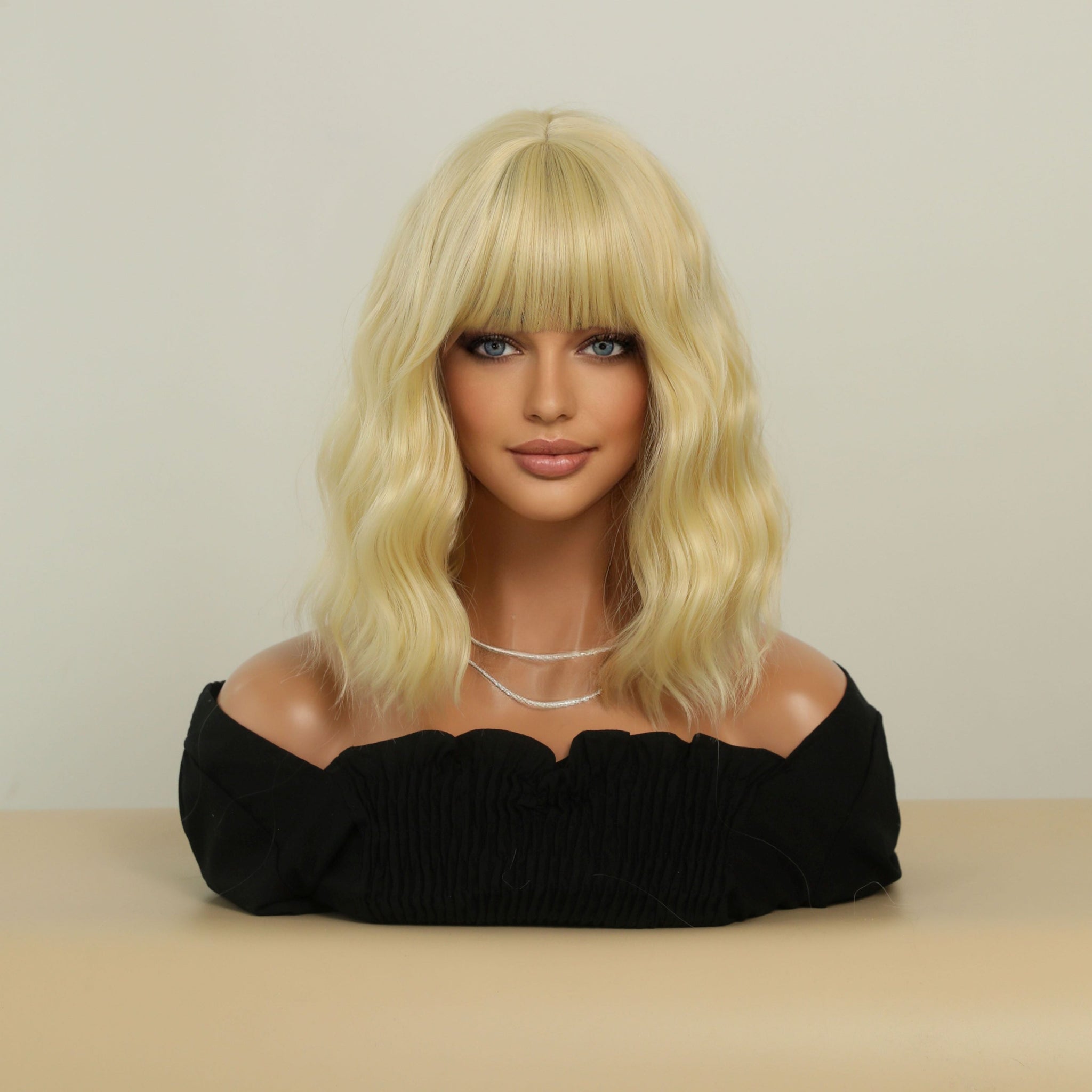 SAKUMETA Blonde Medium-Length Wavy Wig with Bang