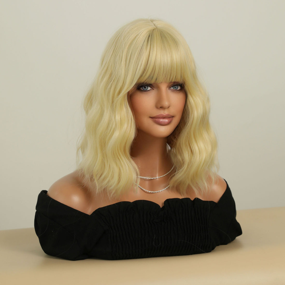 SAKUMETA Blonde Medium-Length Wavy Wig with Bang