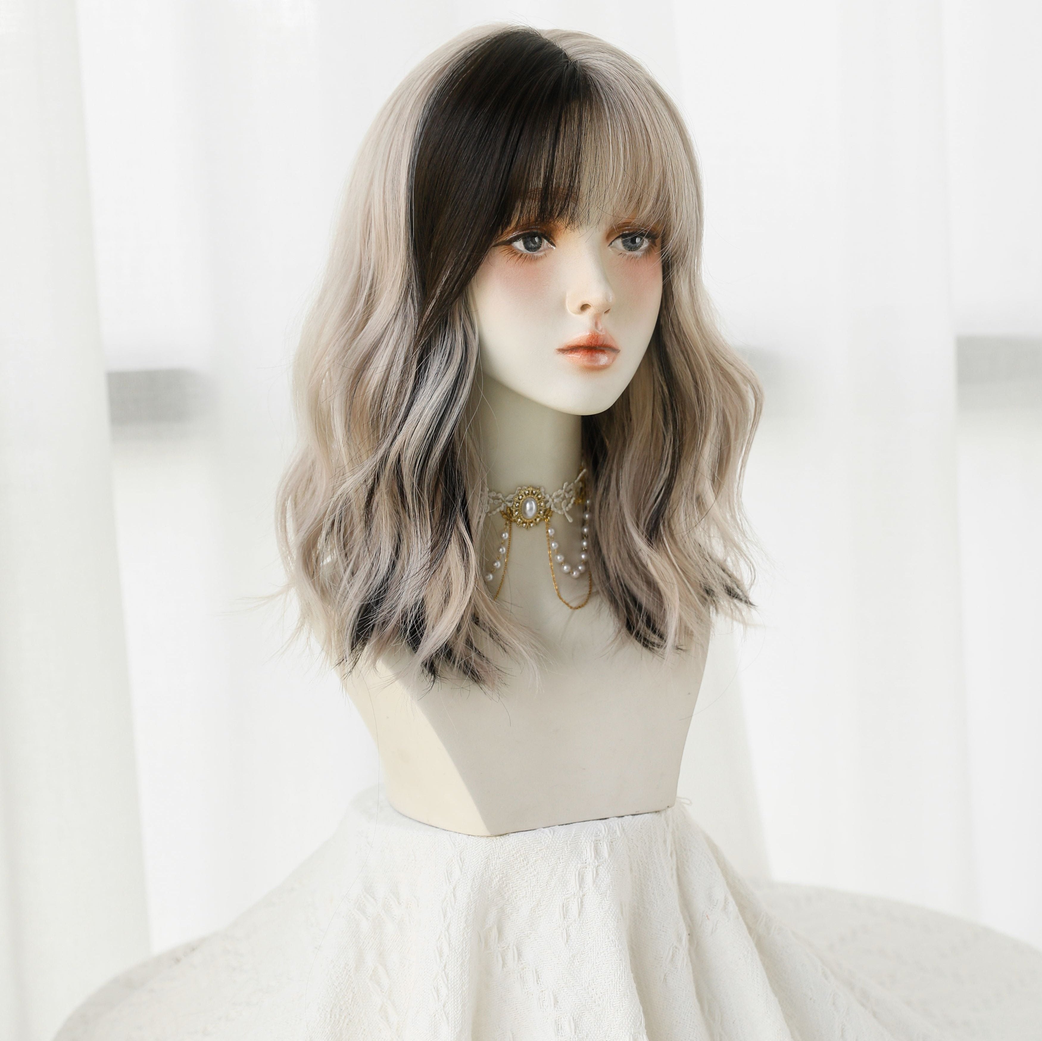 SAKUMETA Cruella Black and White Ombre Short Wavy Wig with Bang
