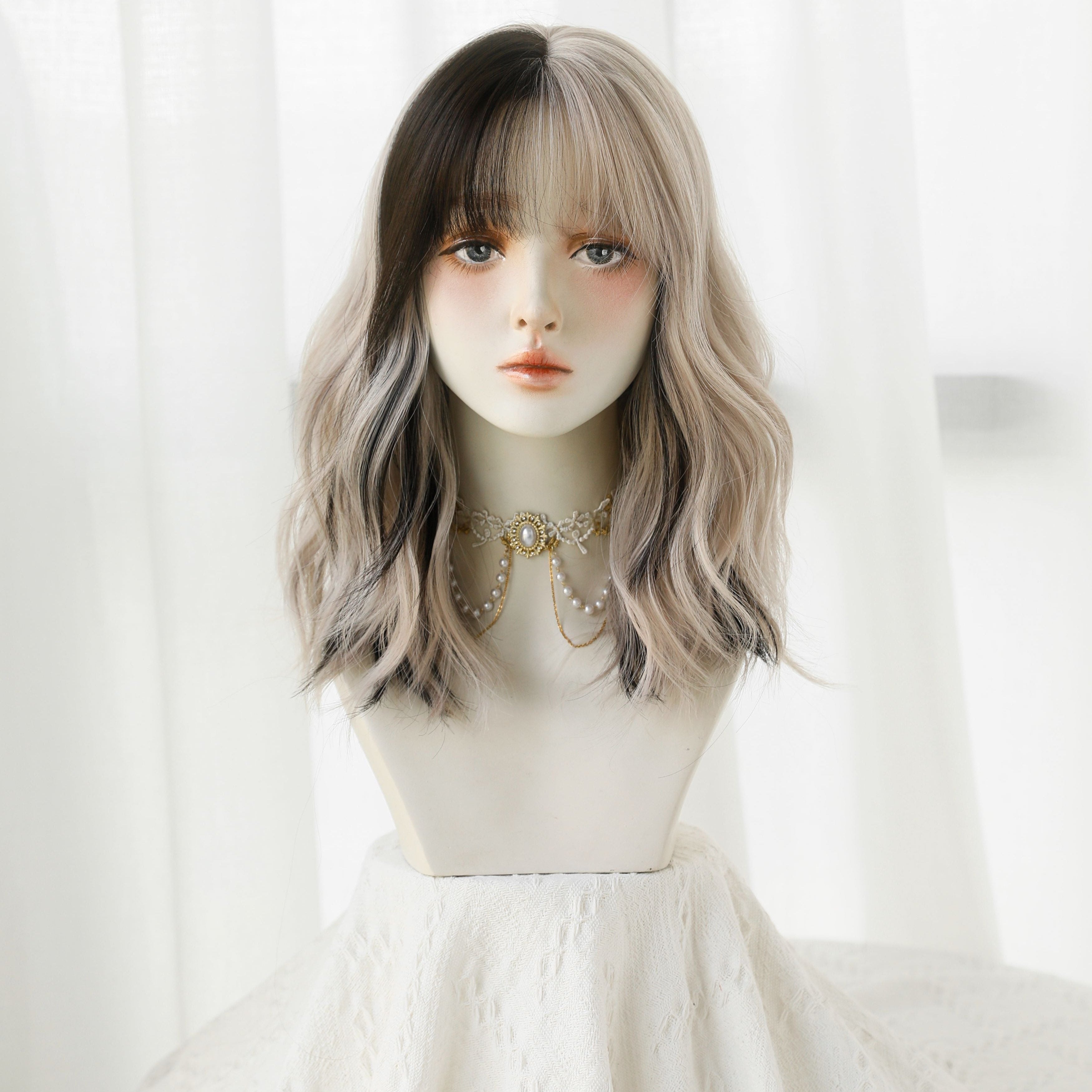 SAKUMETA Cruella Black and White Ombre Short Wavy Wig with Bang