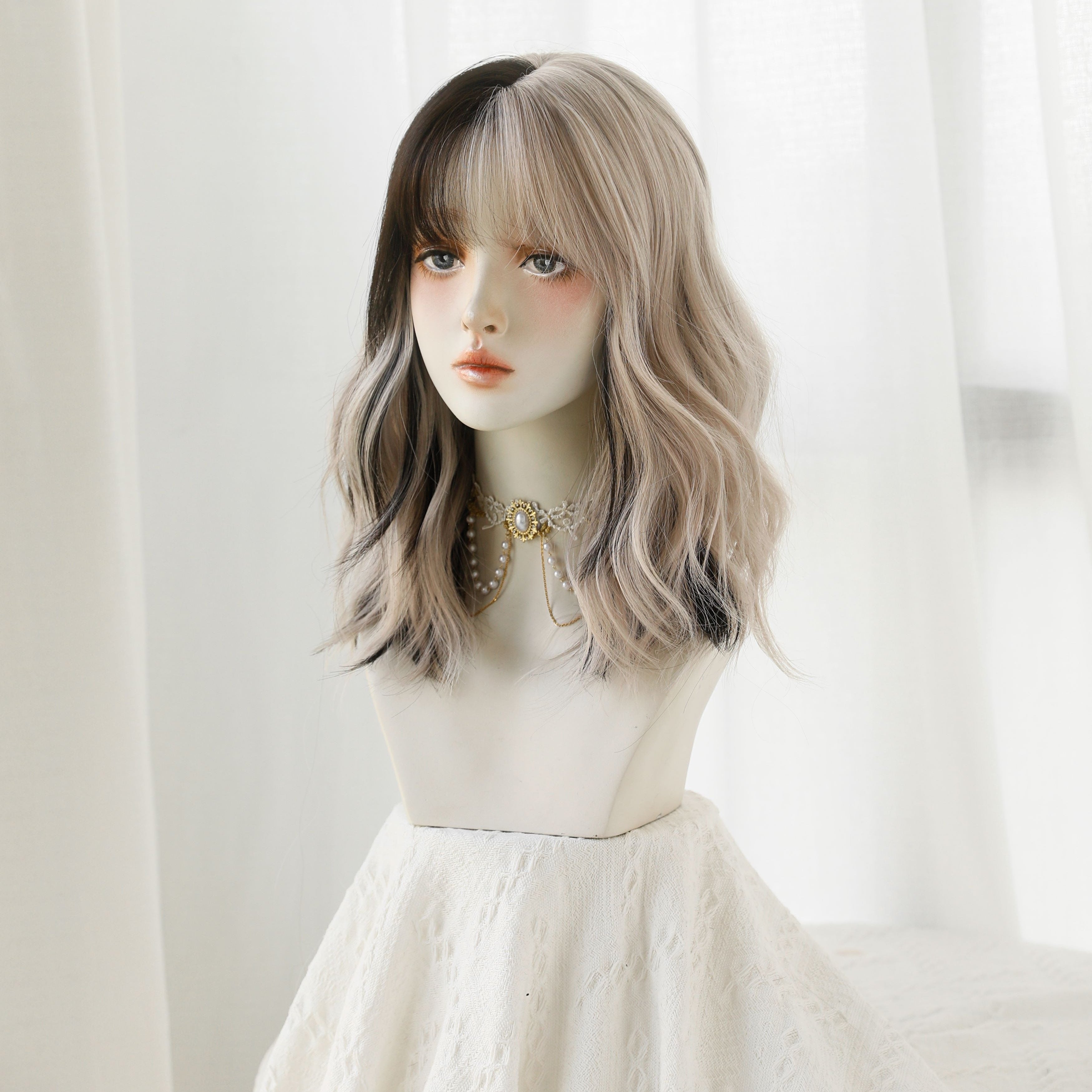 SAKUMETA Cruella Black and White Ombre Short Wavy Wig with Bang